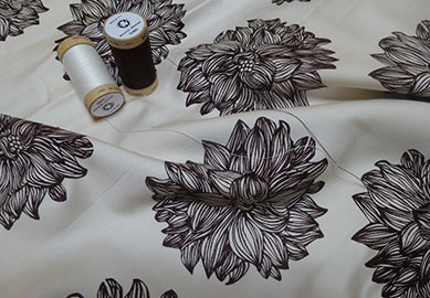 Evelyn Dalhia brown on natural organic cotton sateen